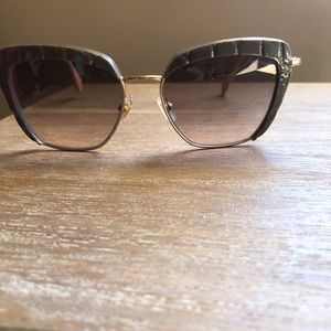Miu Miu sunglasses. Grey Gold light peach on ear piece